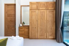 spacious-modern-bedroom-with-wooden-wardrobe.jpg spacious-modern-bedroom-with-wooden-wardrobe.jpg