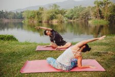 yoga-partners-stretching-their-bodies.jpg