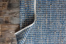 hand-woven-geometric-denim-area-rug-jute-braided-home-background-texture.jpg
